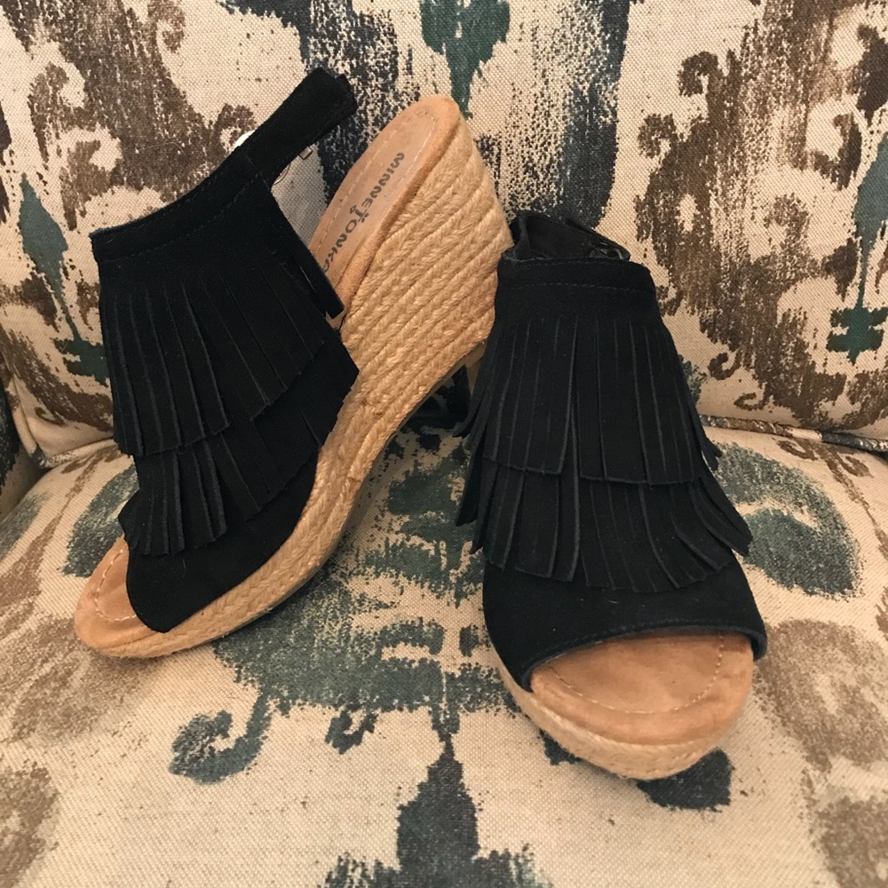 Black Minnetonka fringe wedge espadrilles